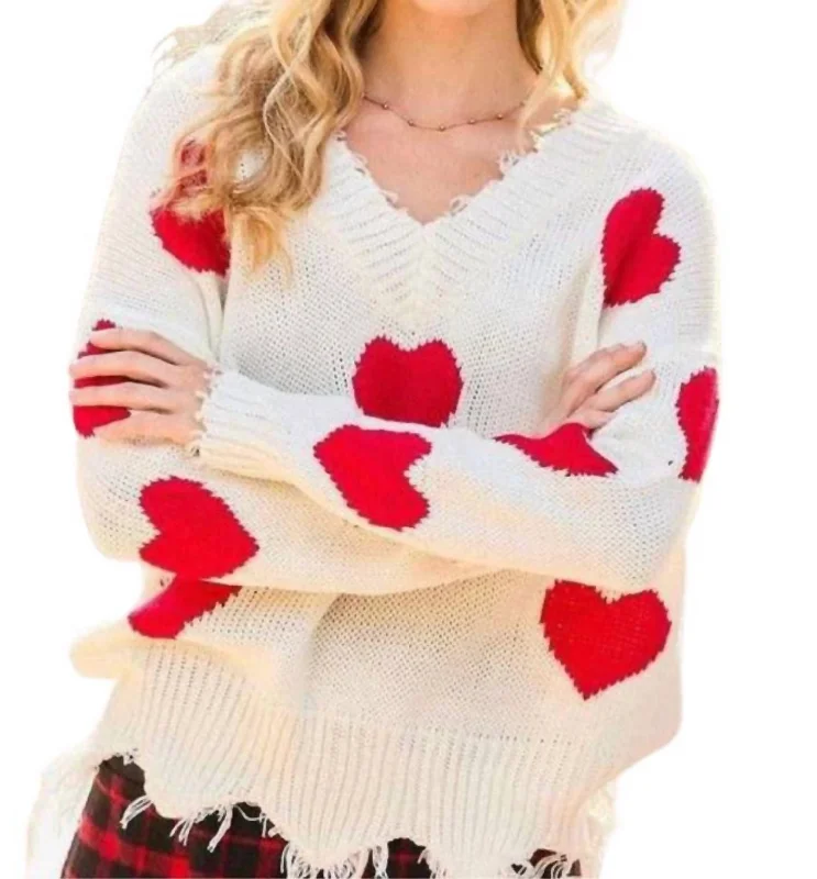 Heart Distressed Sweater In Off White Zippered Buttoned Snapped